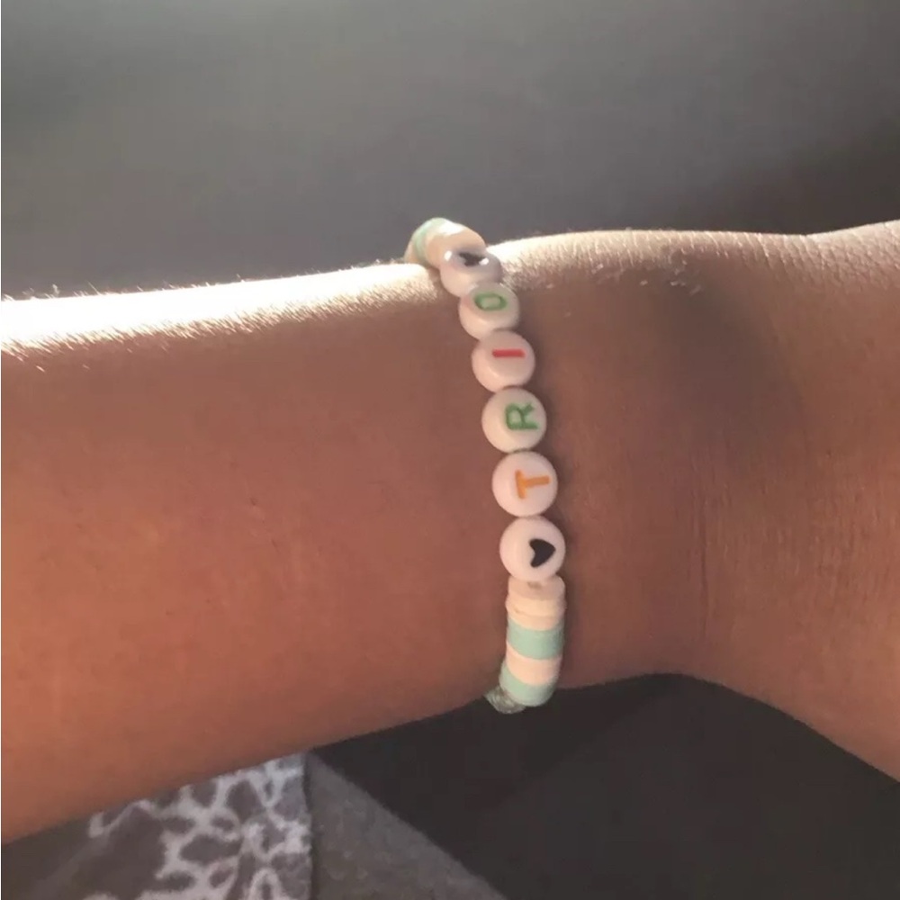 Bracelet that says trio